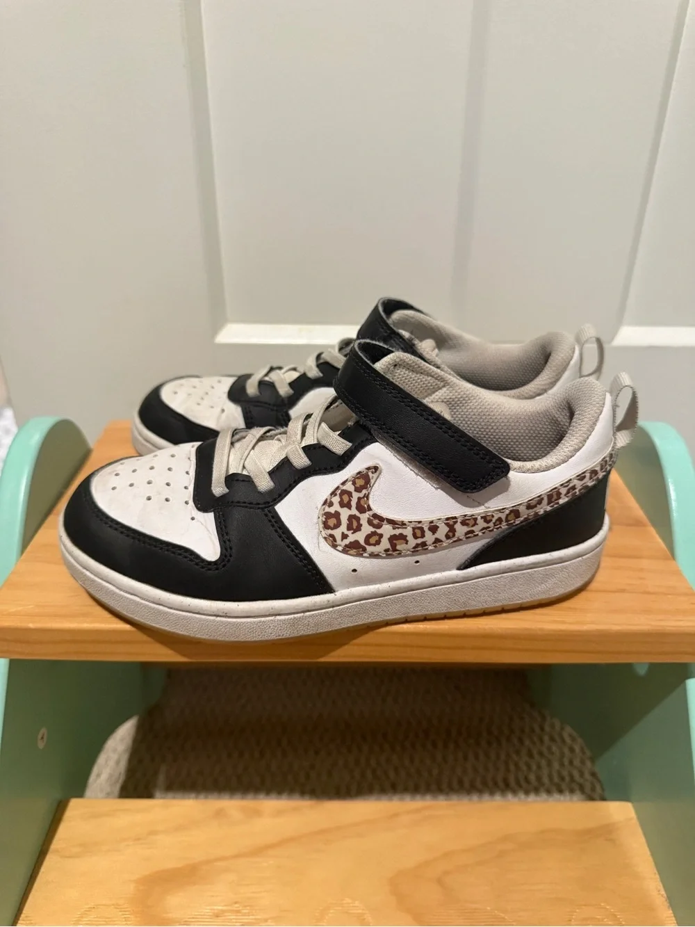 nike shoes with leopard swoosh
